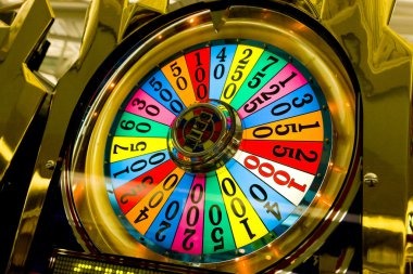 Bikini Paradise slot interface showing five reels with tropical symbols and payline layout